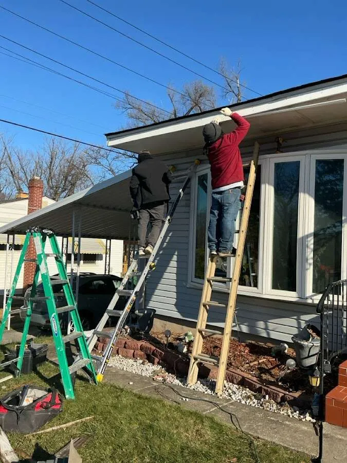 Restoration crew performing exterior repair in Gilmer